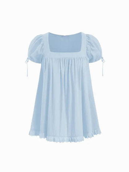 Sweet square neckline, ruffled chest, puff sleeves, adjustable silhouette, casual long shirt